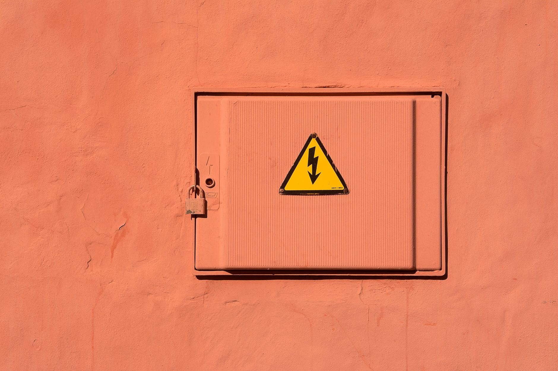 Bright yellow high voltage warning sign on a locked electrical box. — postgresql mcp server mcp server setup guide
