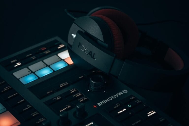 A detailed close-up of music production equipment and headphones, ideal for audio enthusiasts. — elevenlabs music app ai