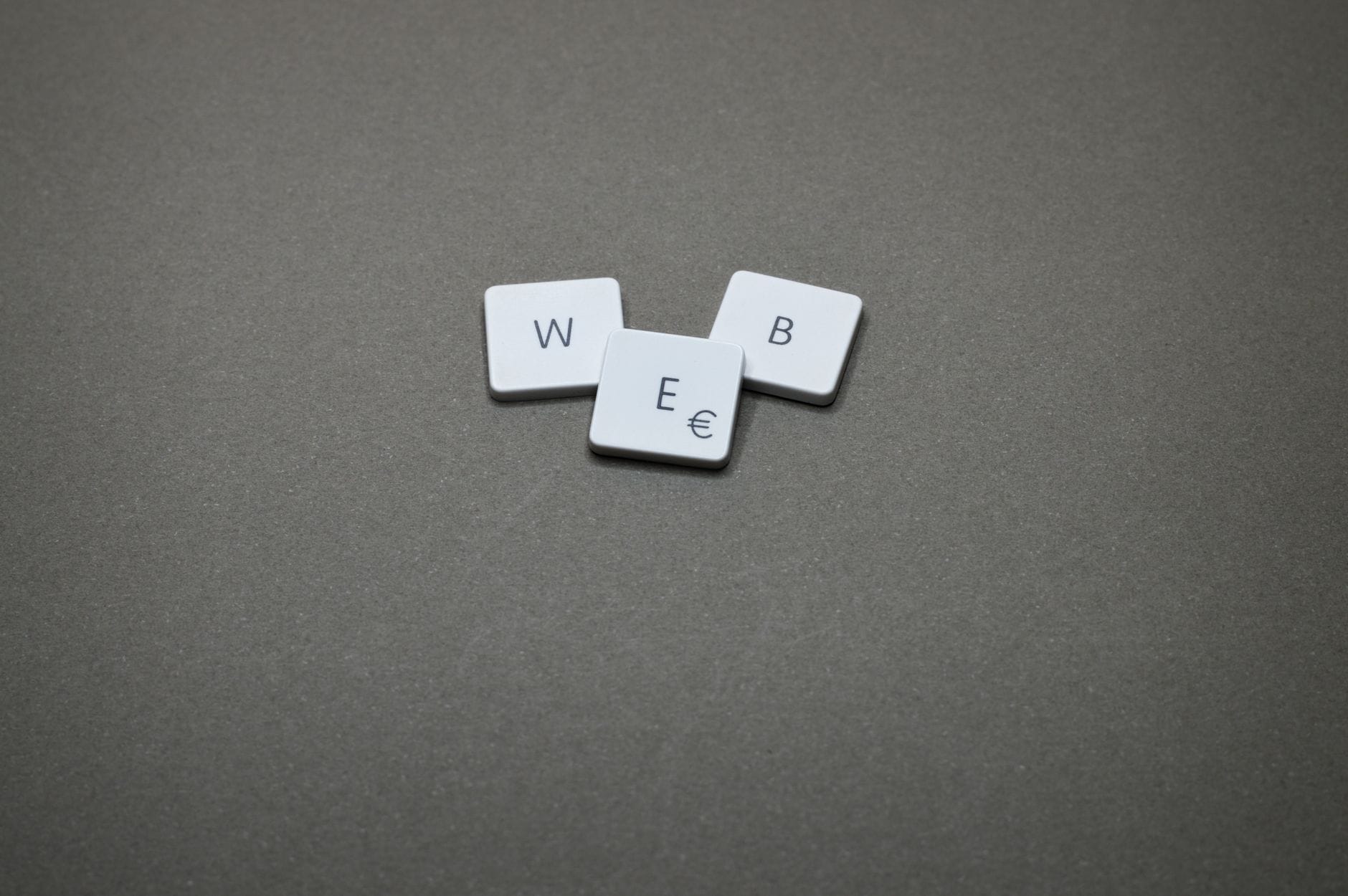 Minimalist image of keyboard keys spelling 'WEB' on a plain background. — brave search mcp server mcp server setup guide