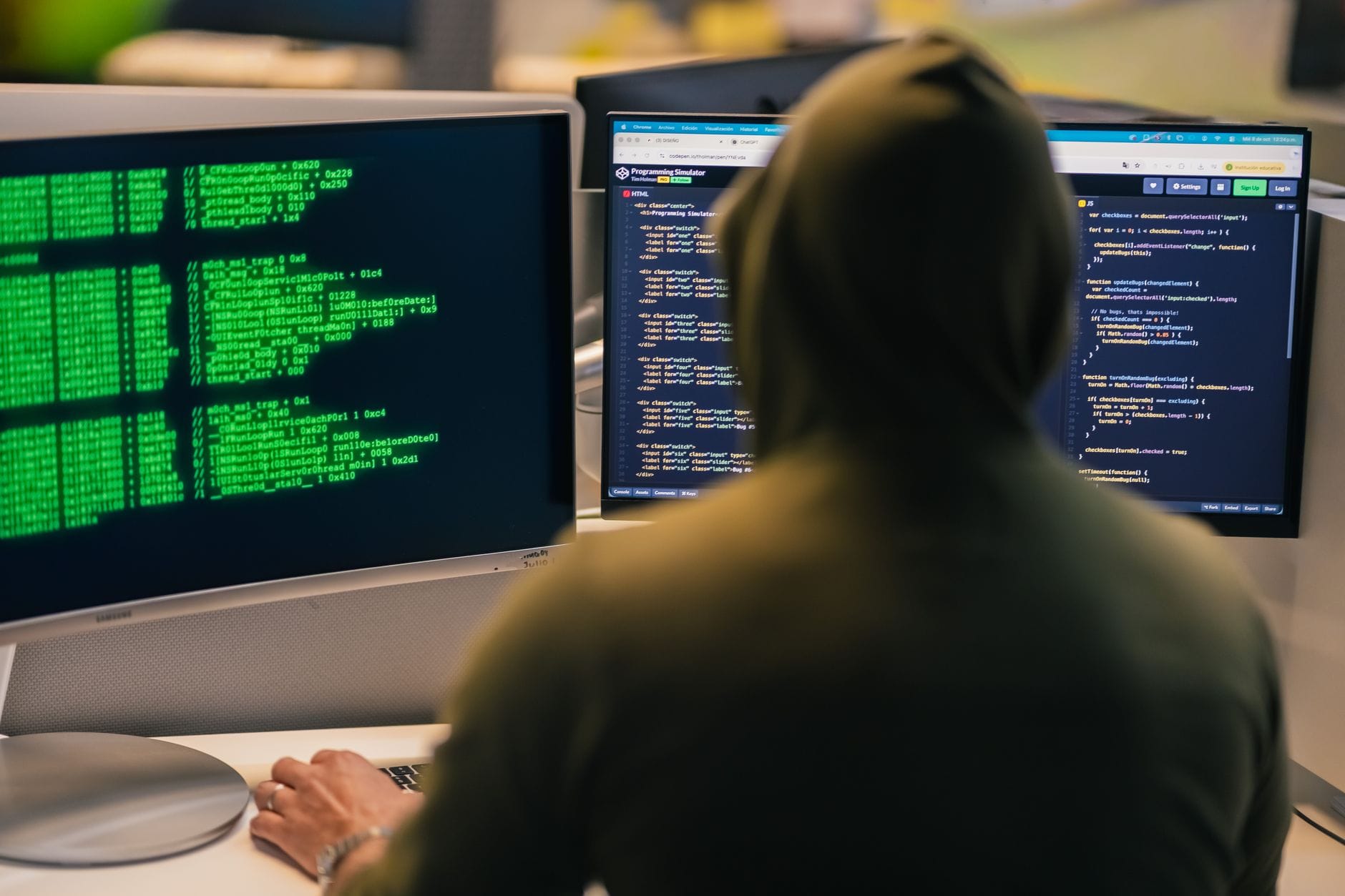 A person in a hoodie coding on dual monitors, depicting cybersecurity and hacking themes. — openai super app codex brows