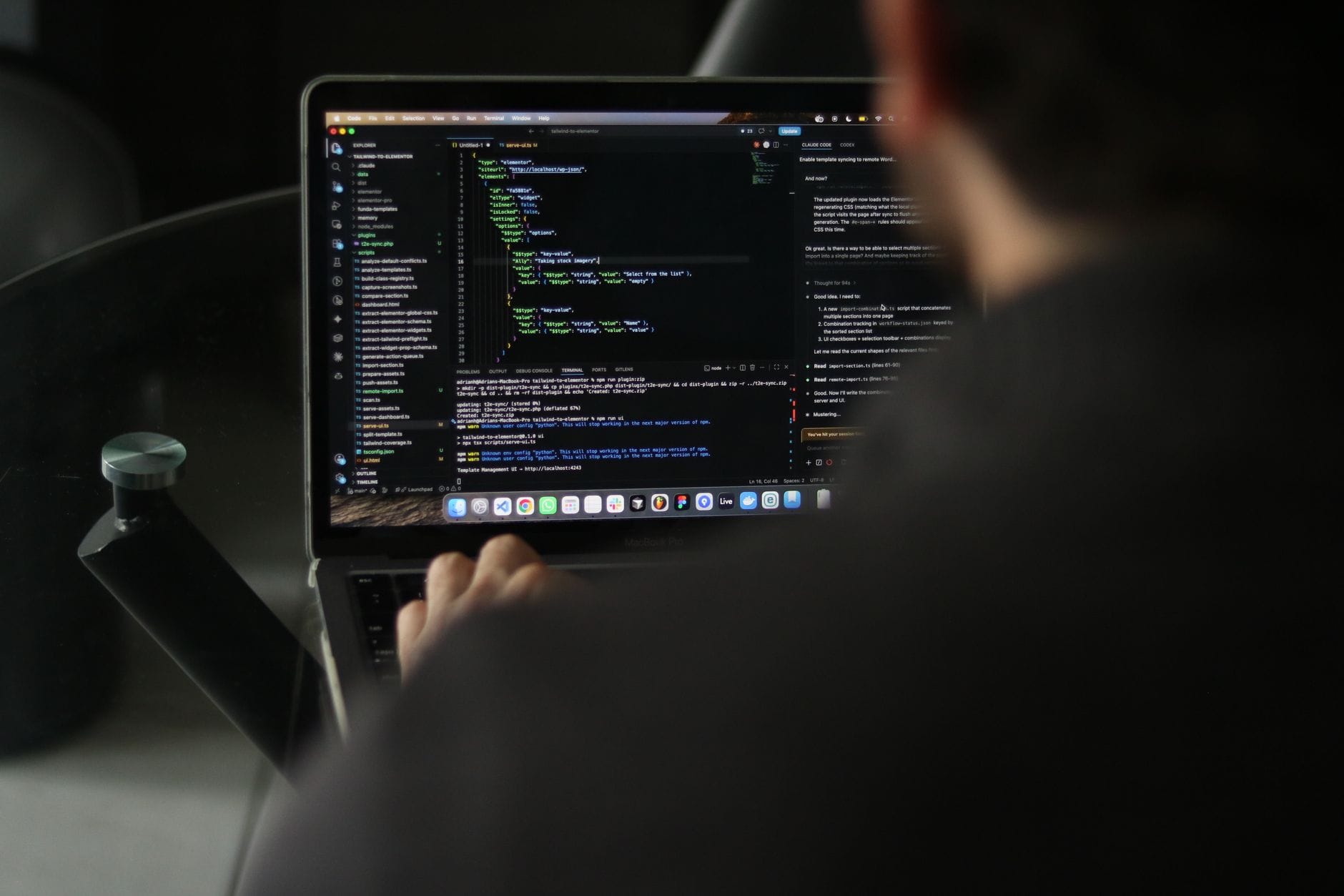 A focused developer writing code on a laptop in an indoor workspace. — windsurf review 2026
