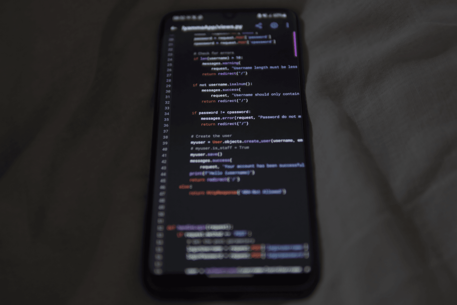 Close-up of a smartphone showing Python code on the display, showcasing coding and technology. — linear mcp server mcp s